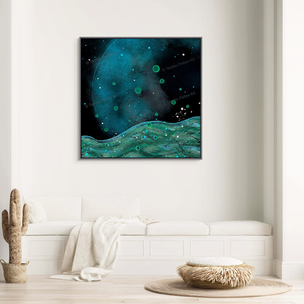 Black and green wall art is on the white wall above a white day bed.