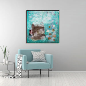 After The Kids Go To Bed canvas art is on the wall behind the it color chair. The art has a coffee cup and candies with relaxing steam in front of the green relaxing background.