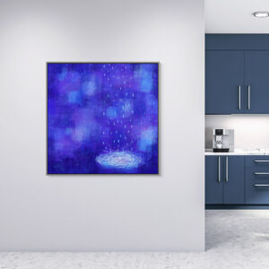A big canvas art of Blue Rain is on the wall in the hallway. There a graysh blue kitchen behind.
