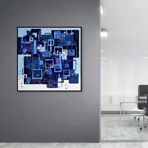 A big canvas print of Await My Dreams is on a gray wall of a hallway in a corporative office building.